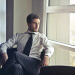 Man Wearing White Dress Shirt and Black Necktie